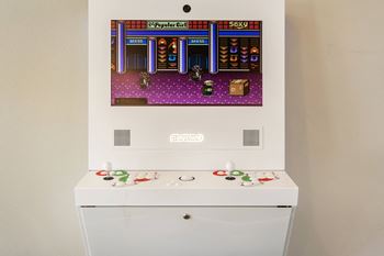 An arcade gaming system at altitude apartments